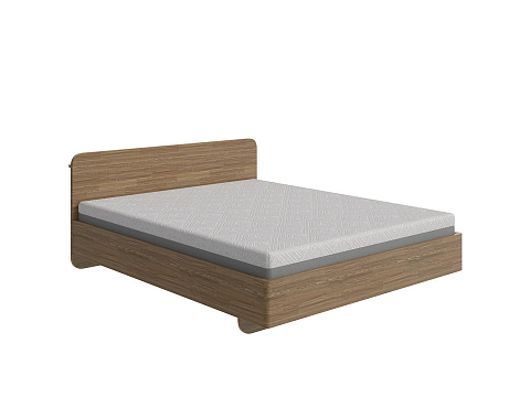 Коричневая кровать Minima - Кровать из массива с округленным изголовьем. 